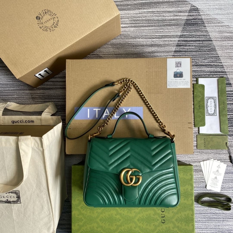 G*u*i top handle bags